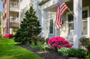 American flag hangs on post of patio